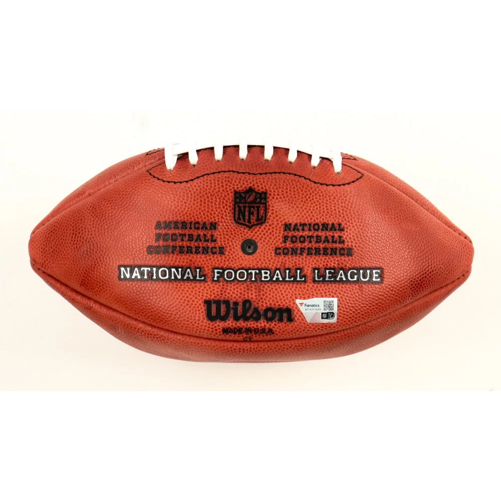 Official Duke NFL football with pebbled leather texture and white laces, signed by Ezekiel Elliott