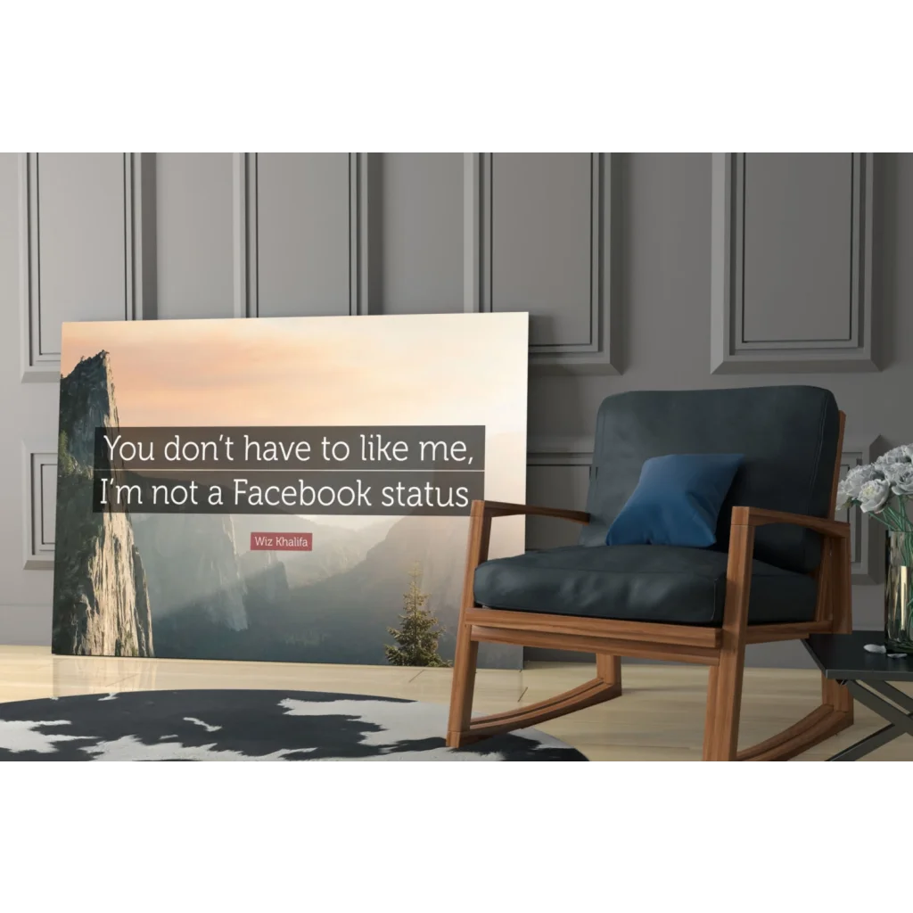 Modern wooden rocking chair with dark blue glass wall art cushion