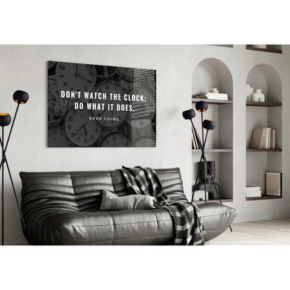 Black and white glass wall art with motivational clock quote
