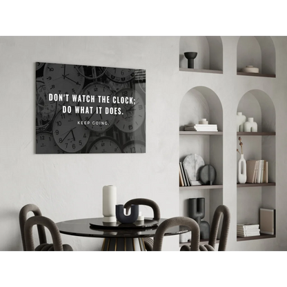 Black and white glass wall art with overlapping clocks and motivational quote