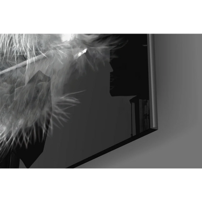 Sleek black-framed glass wall art with white feather patterns
