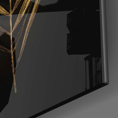 Black glossy mirror with gold leaf detailing in stunning glass wall art
