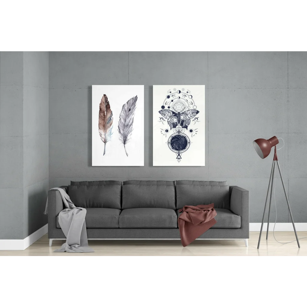 Gray sofa with gray and rust throws under stunning butterfly feather glass wall art
