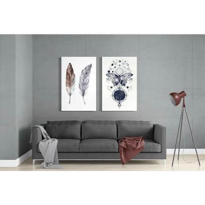 Gray sofa with gray and rust throws under stunning butterfly feather glass wall art
