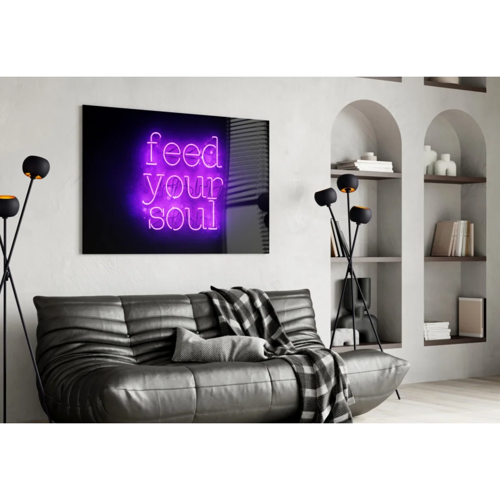 Purple neon Feed Your Soul glass wall art sign on black background