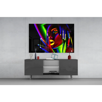 Vibrant neon glow glass wall art portrait above gray console