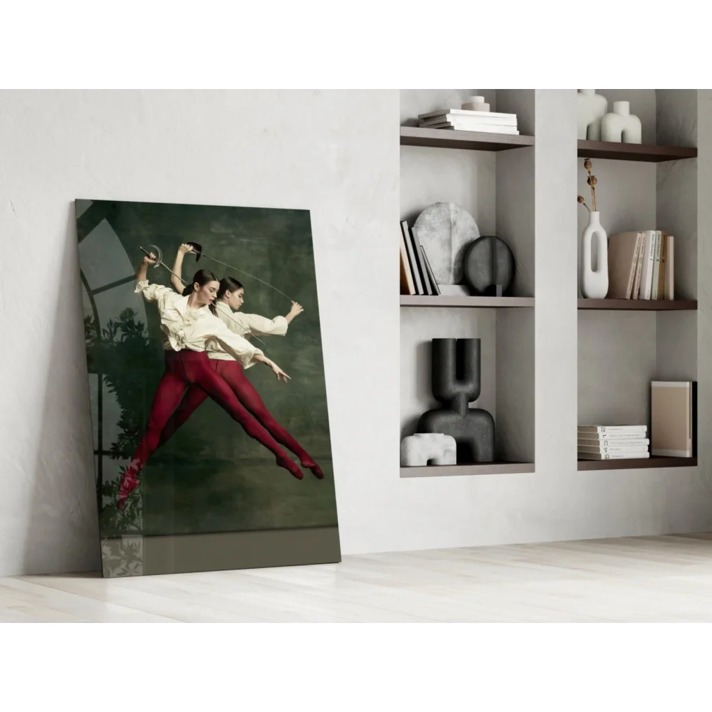 Tall glass wall art print of leaping dancers on dark green backdrop
