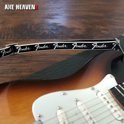 Black Fender logo mini model guitar strap with silver hardware