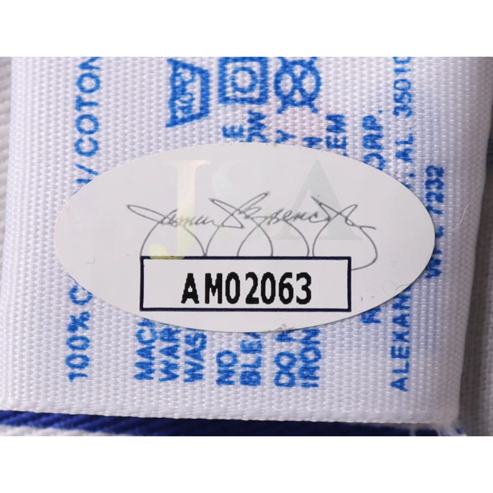 White fabric clothing label with signature and serial number on Fergie Jenkins signed Cubs jersey