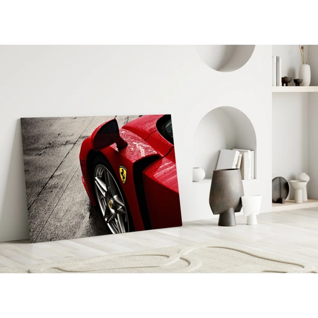 Red Ferrari glass wall art canvas print with glossy finish and front wheel close-up