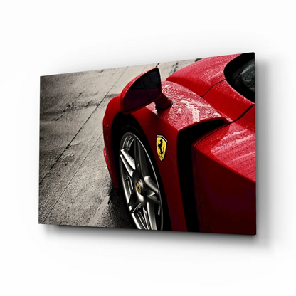 Vibrant red Ferrari glass wall art canvas print with glossy finish and prancing horse emblem