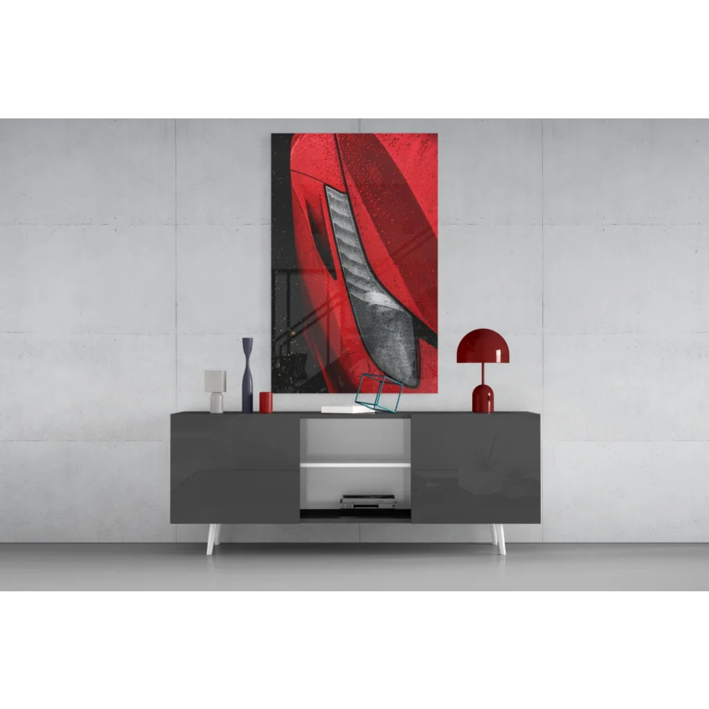 Vibrant red and black abstract glass wall art of stylized car profile