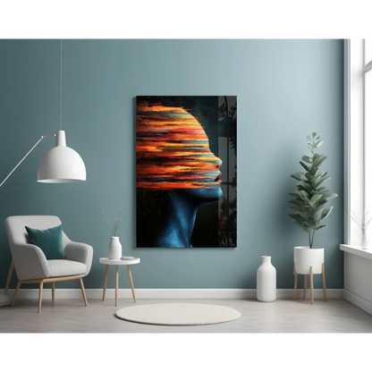Fiery abstract profile canvas wall art in orange and blue on teal wall