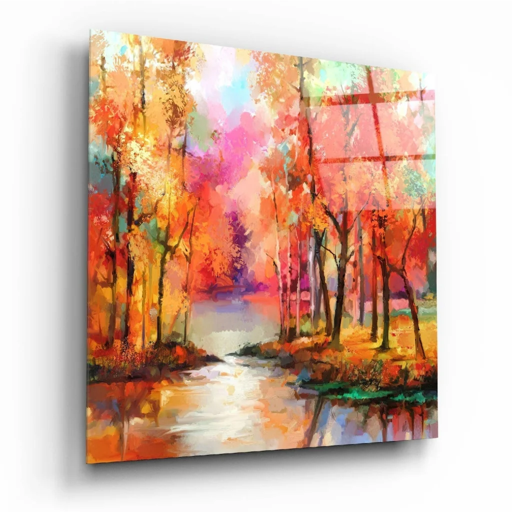 Vibrant fiery forest glass wall art with bold orange pink red hues