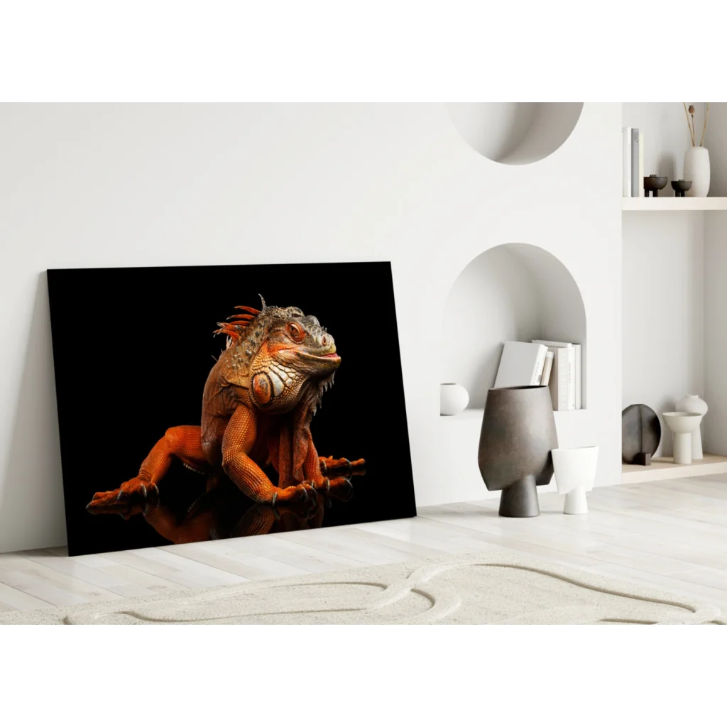 Vibrant fiery orange iguana glass wall art on black canvas