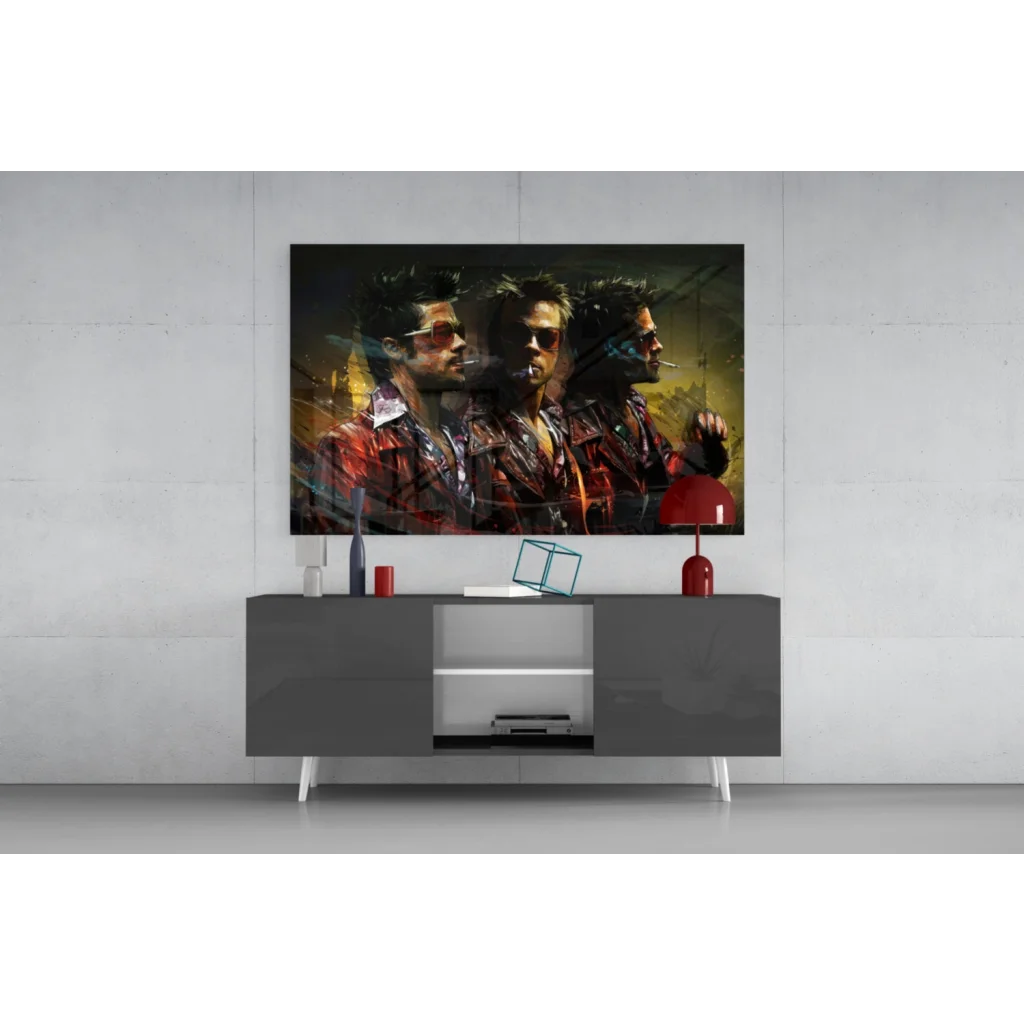 Stylized glass wall art of three men in red jackets on vibrant yellow black canvas