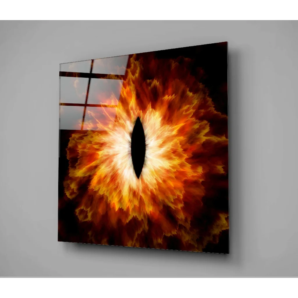 Fiery eye glass wall art with vibrant orange yellow flames on reflective panel