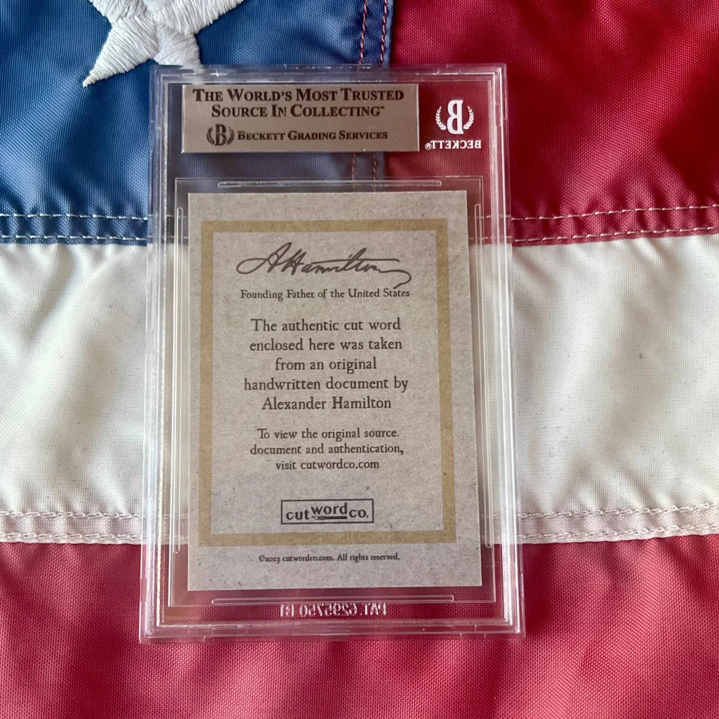 Beckett graded Alexander Hamilton words authentic piece in clear holder, perfect for collectors
