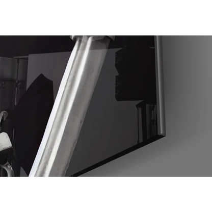 Sleek silver sword blade in futuristic robot skull glass wall art