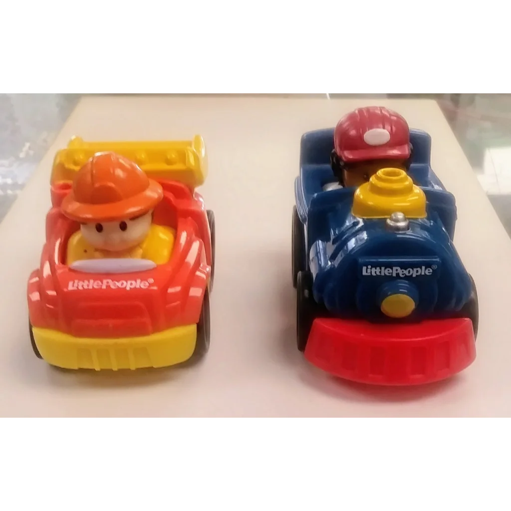 Red and yellow Fisher Price set toy car with hard hat construction worker figure