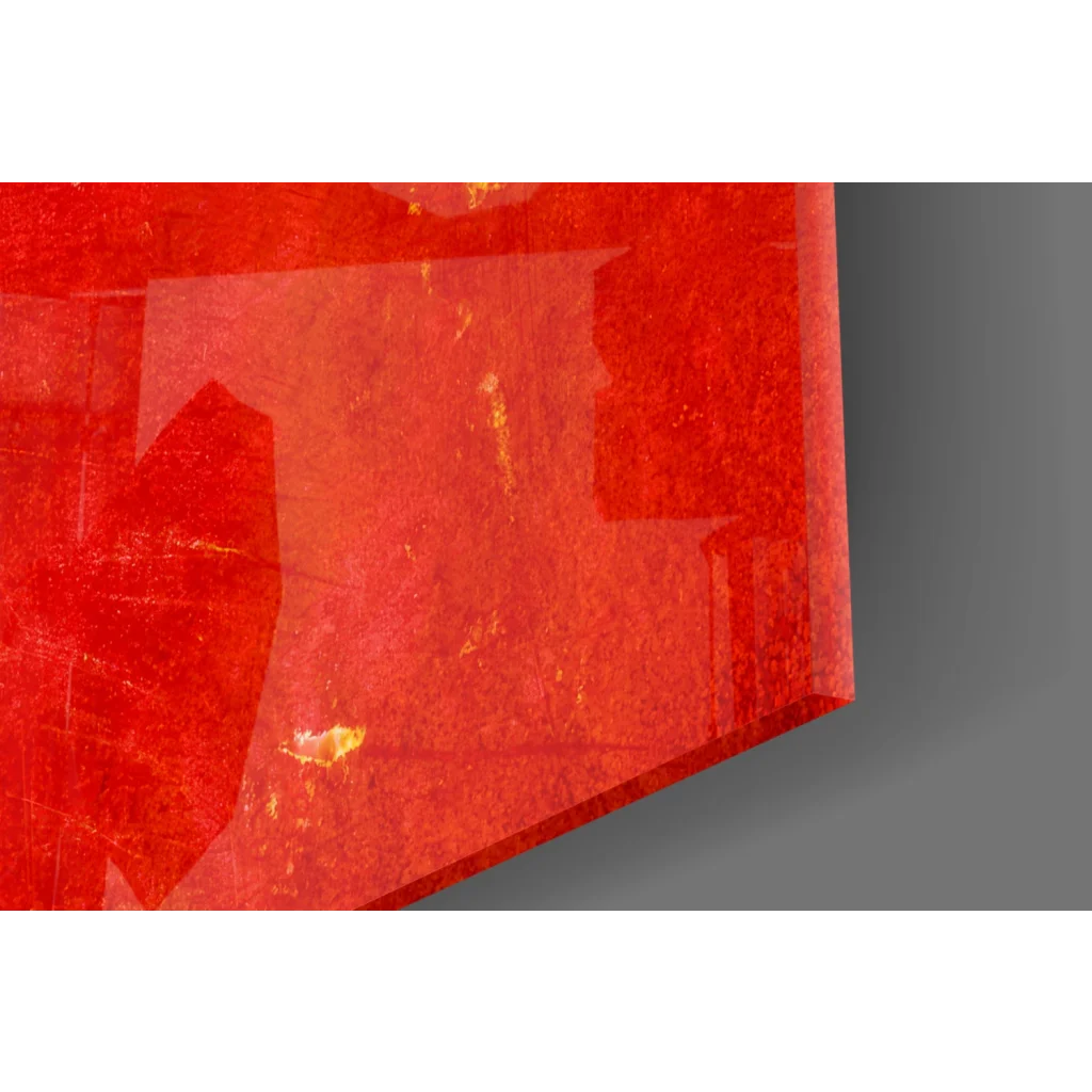 Vibrant red translucent glass wall art gemstone with golden inclusions