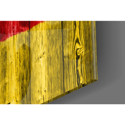 Rustic German flag wall art on yellow wood-grain panel with red accent