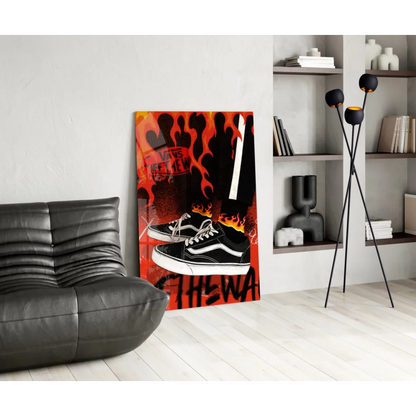 Flaming Vans Old Skool sneakers on orange black flame glass wall art