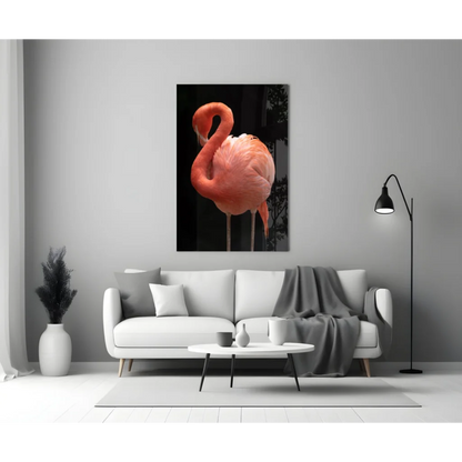 Vibrant pink flamingo glass wall art on black canvas against gray wall