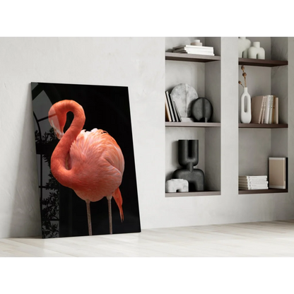 Vibrant pink flamingo glass wall art on sleek black canvas against white wall