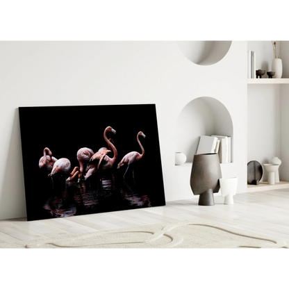 Pink flamingos canvas wall art print in black frame on dark background