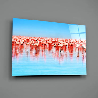Vibrant pink flamingo flock wall art canvas with blue water reflections