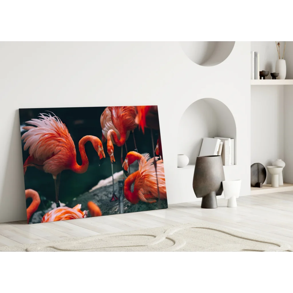 Vibrant pink flamingo canvas wall art print leaning on white wall