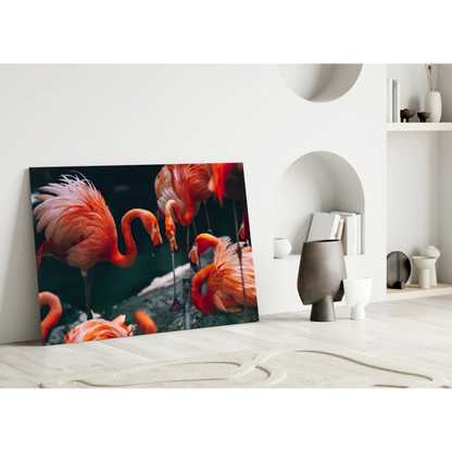 Vibrant pink flamingo canvas wall art print leaning on white wall