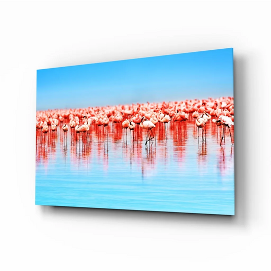 Vibrant pink flamingo flock wall art canvas with blue water reflections
