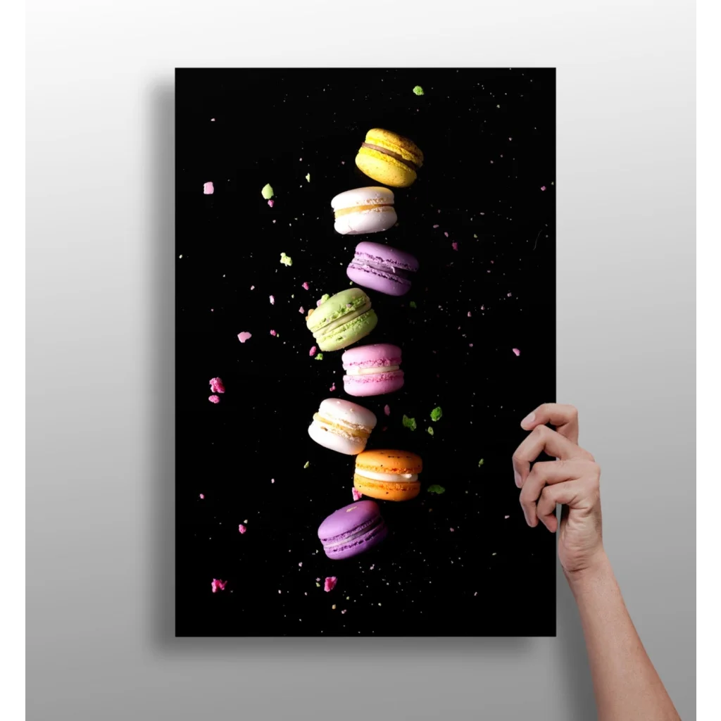 Vibrant vertical canvas print of colorful floating macarons on black aluminum
