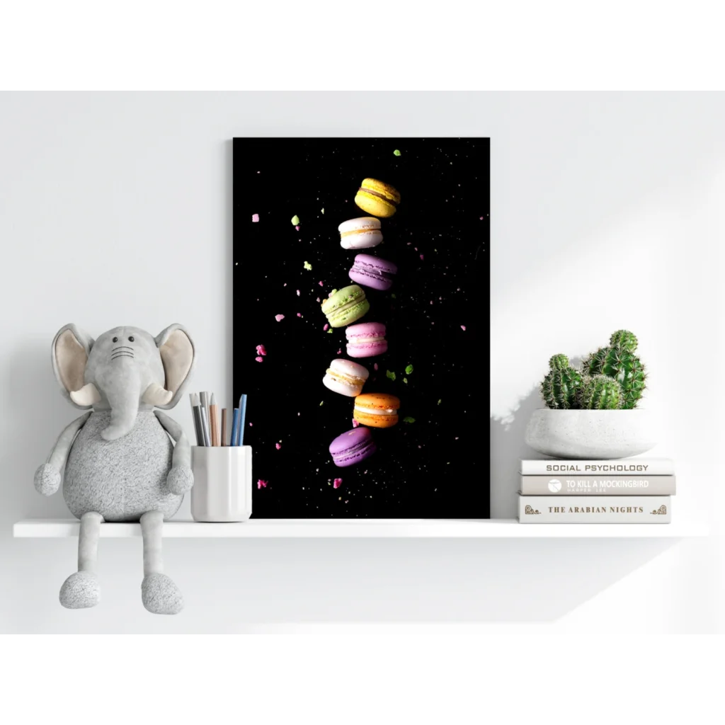 Vibrant floating macarons canvas print on black aluminum