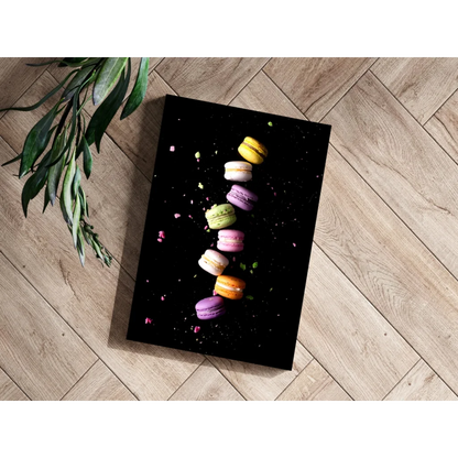 Colorful pastel macarons on black floating canvas print