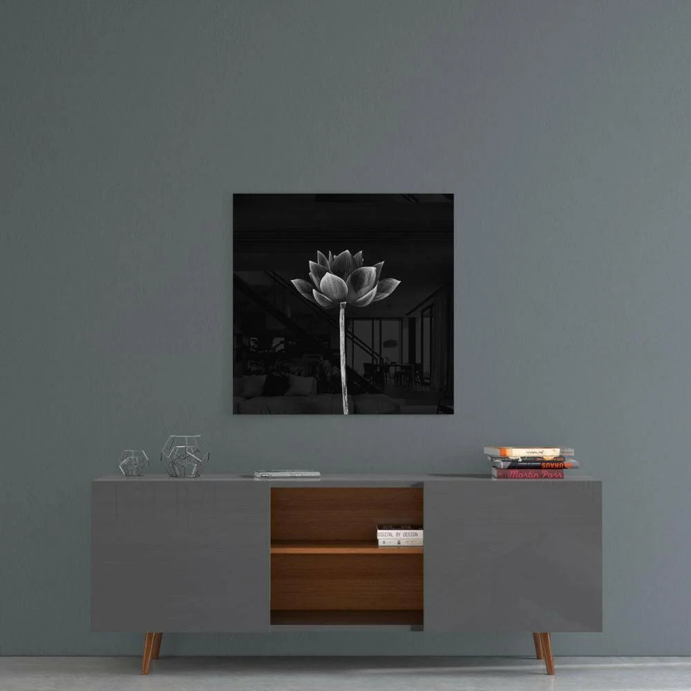 Stylized black and white lotus on stunning minimalist glass wall art panel