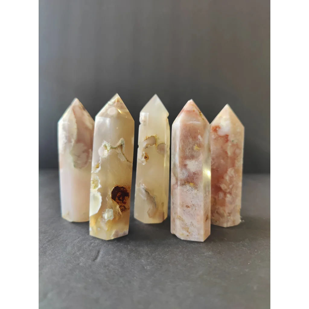 Five translucent flower agate tower crystal points with creamy white and warm pinkish-brown natural patterns
