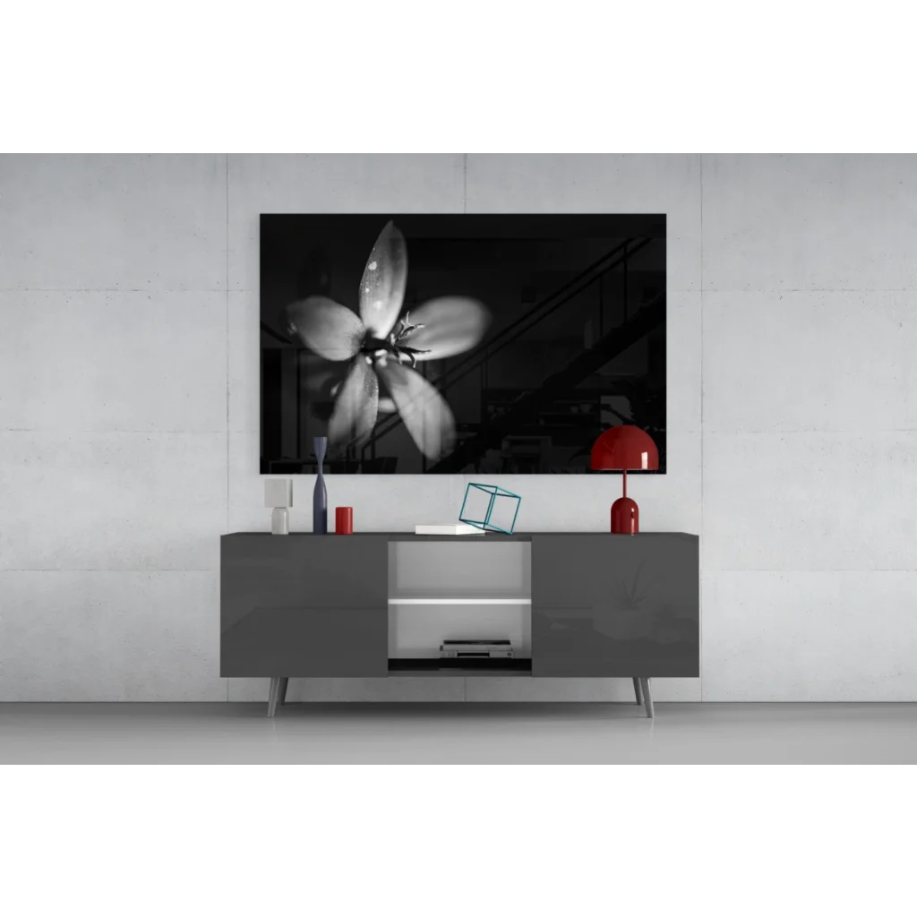 Black-and-white floral wall art canvas print above gray console table