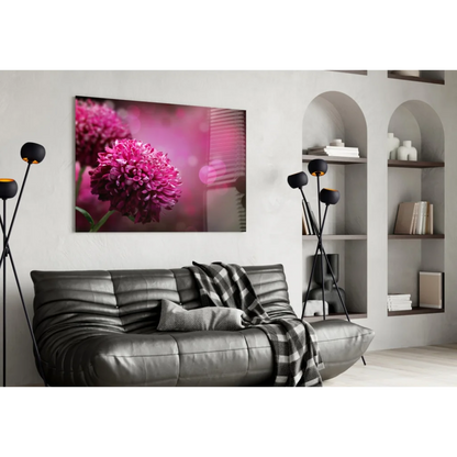 Vibrant magenta chrysanthemum glass wall art with bokeh glow on white wall