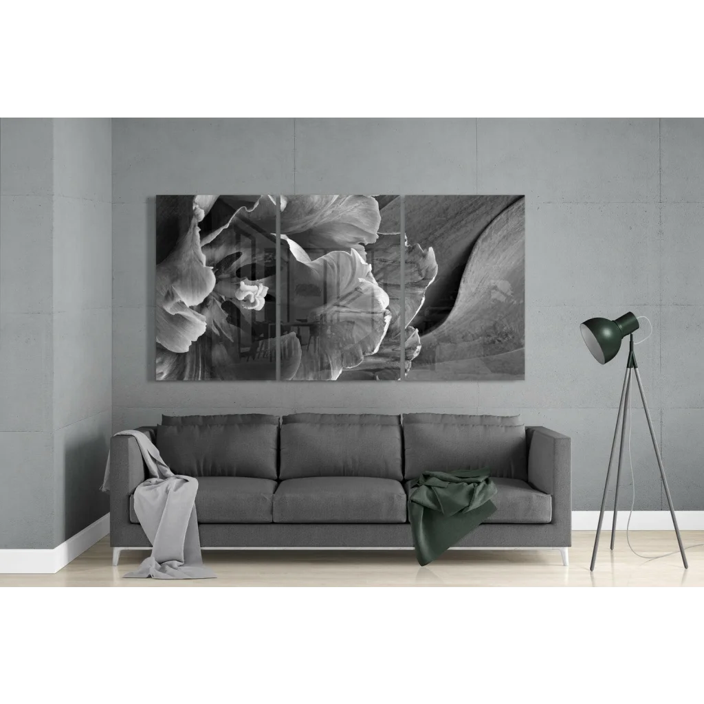 Black-and-white glass wall art triptych of layered textured petals