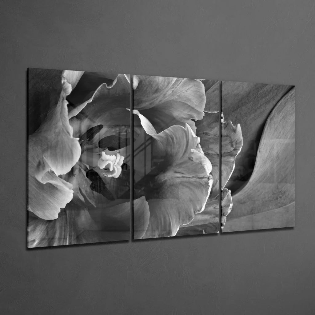 Black and white layered petals glass wall art triptych close-up