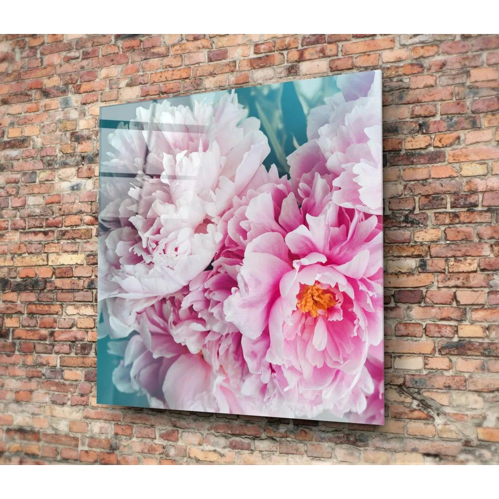 Vibrant pink peony floral print on glossy glass wall art panel