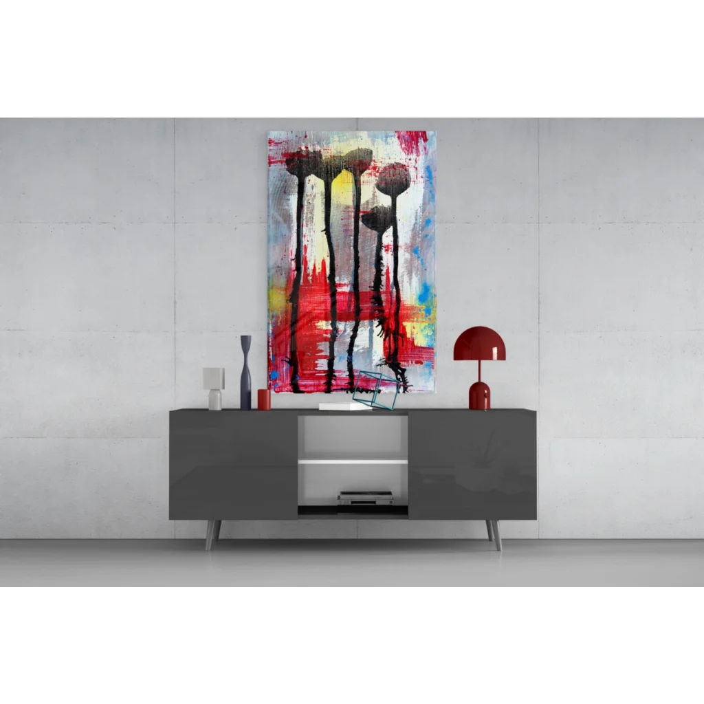 Vibrant glass wall art with bold floral silhouettes and color bursts