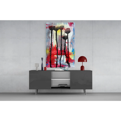 Vibrant glass wall art with bold floral silhouettes and color bursts
