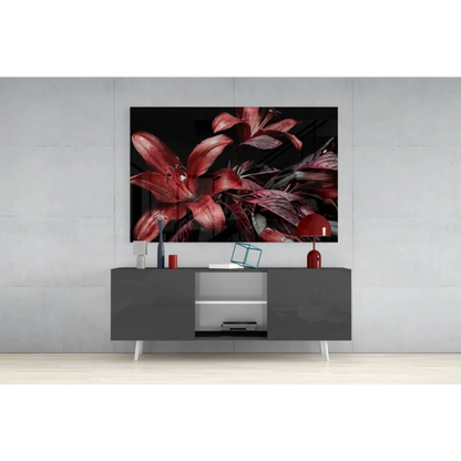 Stunning red lily glass wall art on black canvas with glossy petals