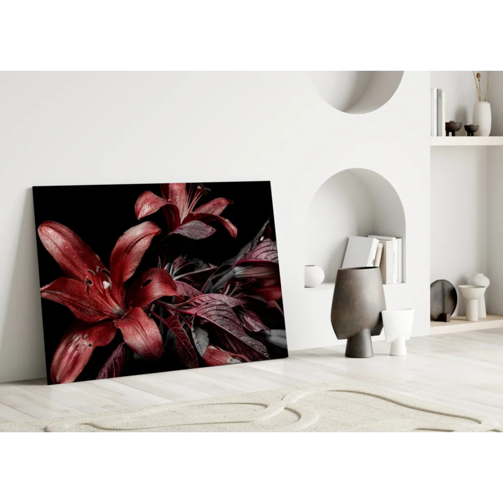 Stunning red lily glass wall art on black canvas with glossy petals