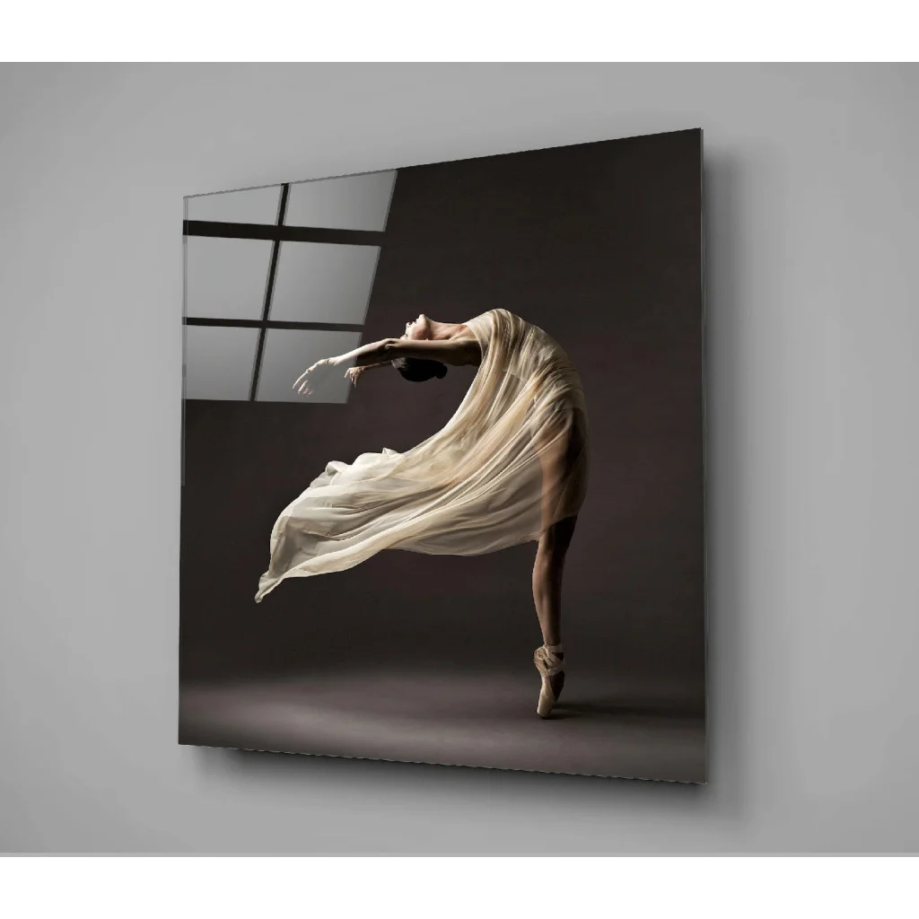 Flowing ballerina glass wall art with white fabric on black background