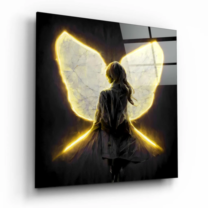 Glowing yellow butterfly-winged angel glass wall art on dark background